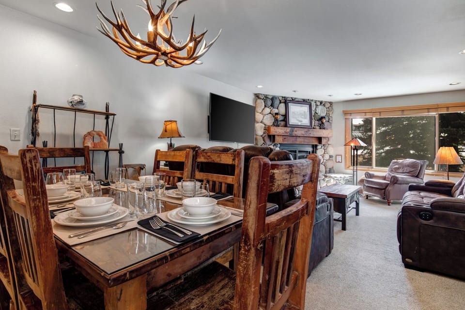 Snow Flower 20 has a wood dining table and 6 wood chairs.