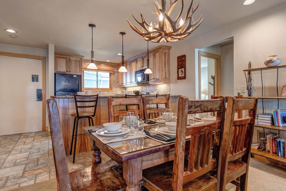 Snow Flower 20 has a wood dining table and 6 wood chairs.