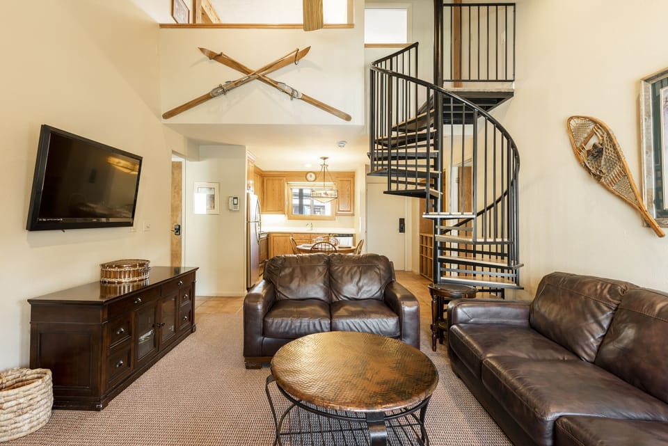 Spiral staircase leading to the loft area