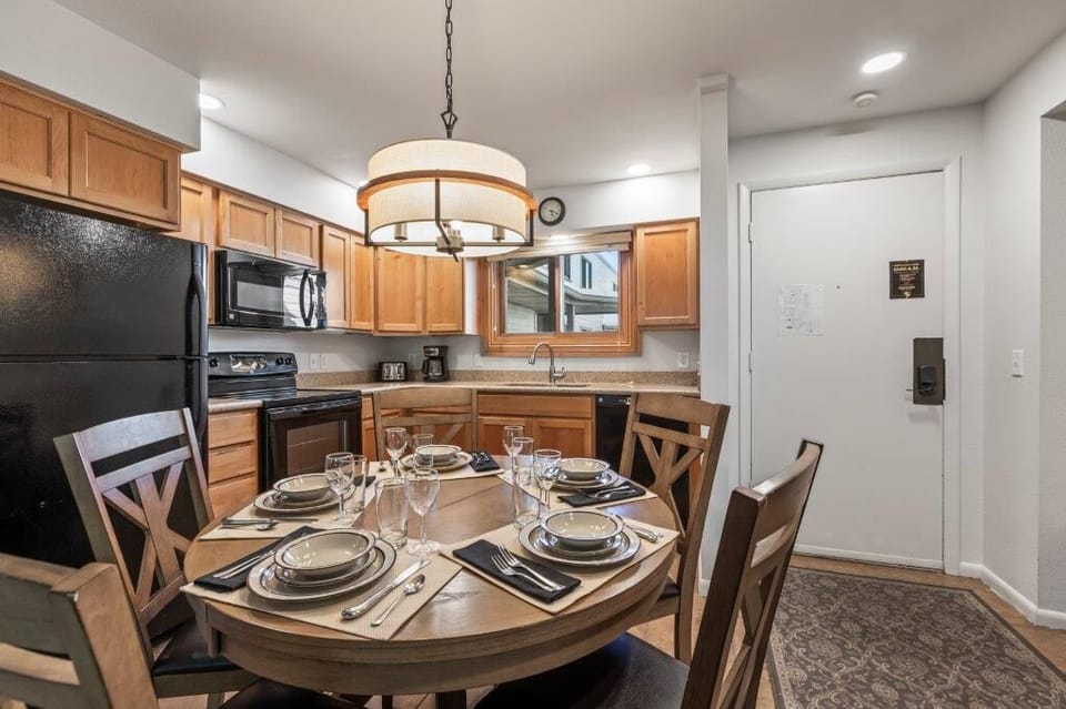 Snow Flower 79 offers an open concept kitchen with a dining area with seating for five guests.