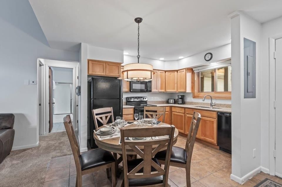 Snow Flower 79 offers an open concept kitchen with a dining area with seating for five guests.
