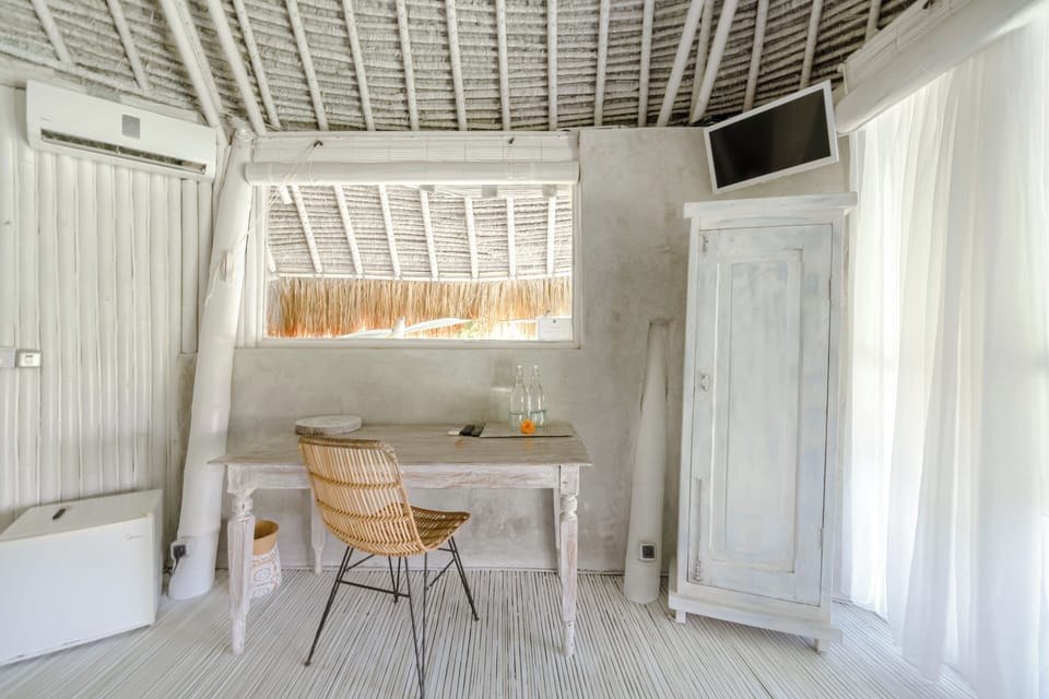 Standard Bungalow | Minibar, in-room safe, iron/ironing board, free WiFi