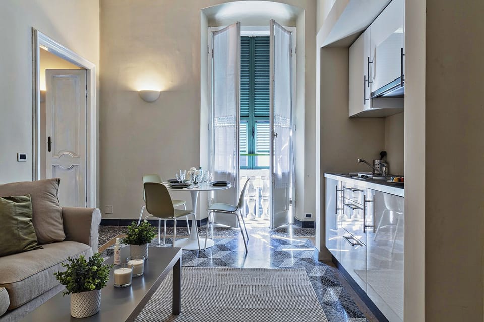 Apartment, 1 Bedroom | Private kitchen | Coffee/tea maker, full-size fridge, oven, stovetop
