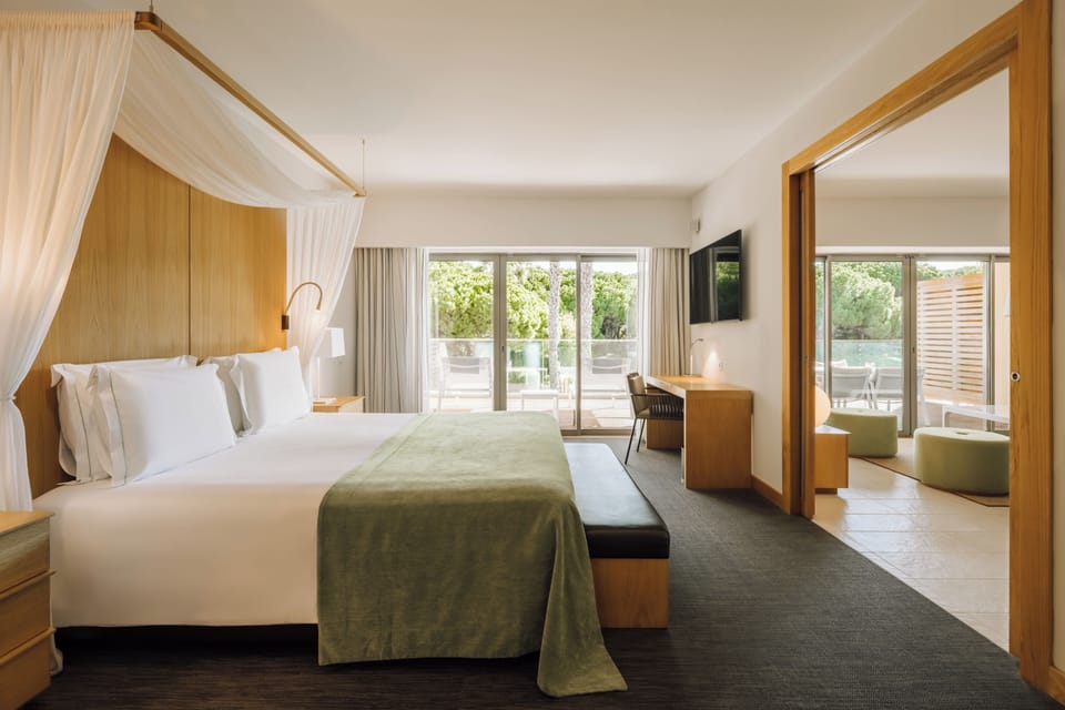 Suite Home - Pool View | 1 bedroom, premium bedding, minibar, in-room safe