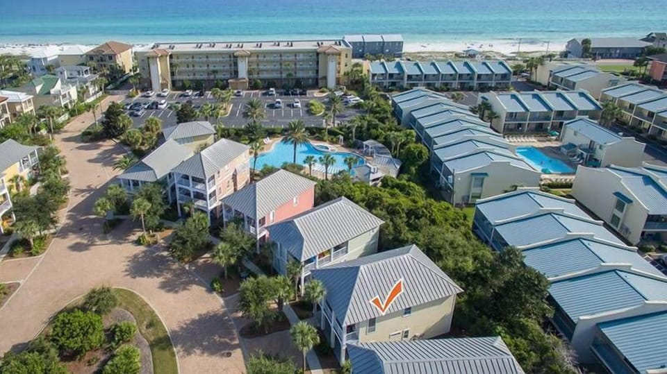 View of Sandy Toes with it's close proximity to the  white sands and turquoise blue waters!