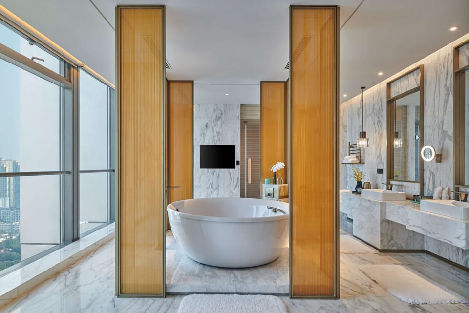 Presidential Suite, 1 King Bed | Bathroom | Separate tub and shower, rainfall showerhead, designer toiletries