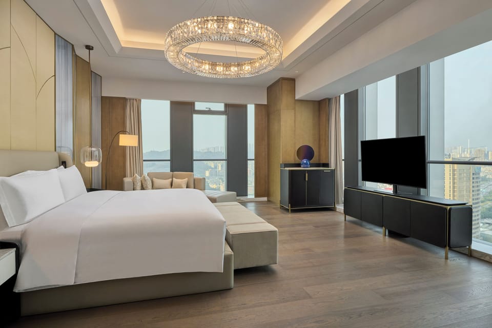 Presidential Suite, 1 King Bed | Living area | 55-inch LED TV with cable channels, TV, pay movies