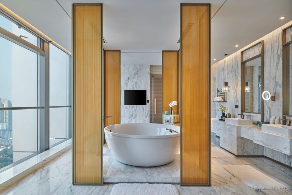 Presidential Suite, 1 King Bed | Bathroom | Separate tub and shower, rainfall showerhead, designer toiletries