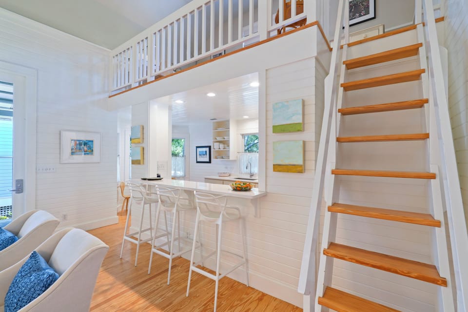 KITCHEN WITH BARSTOOL SEATING FOR 3