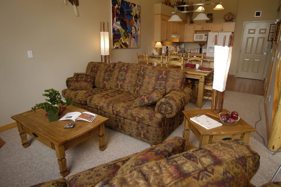 Seating area provides additional hideaway beds. Wake up to views of the Rockies.