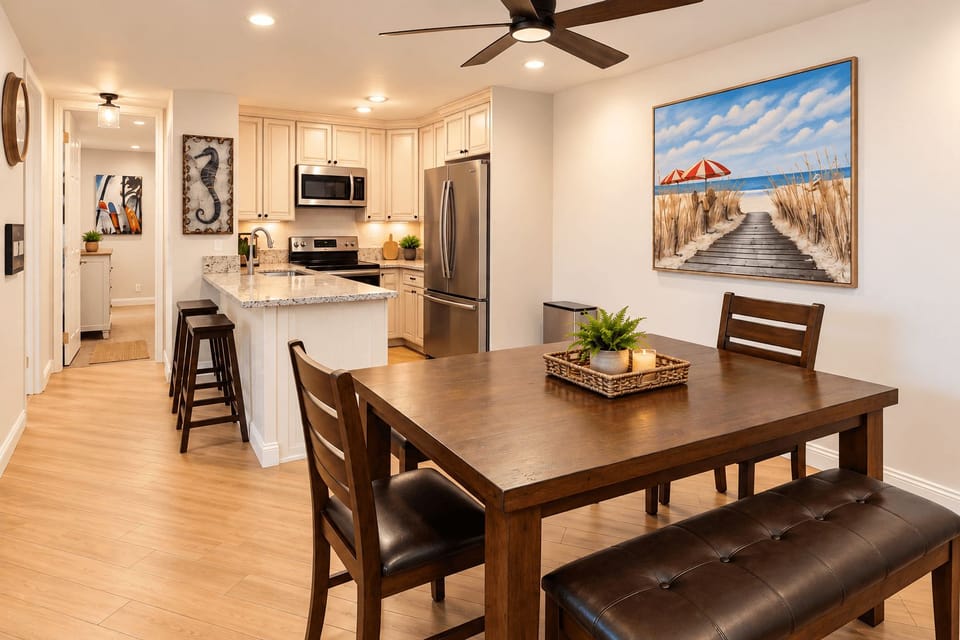 Kitchen with stainless steel appliances and dining for 6, Keurig coffee machine