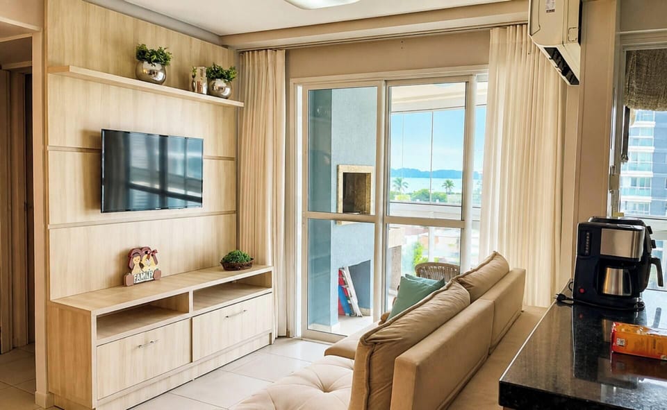 Premium Apartment | Living area | 55-inch Smart TV with cable channels, TV, Netflix