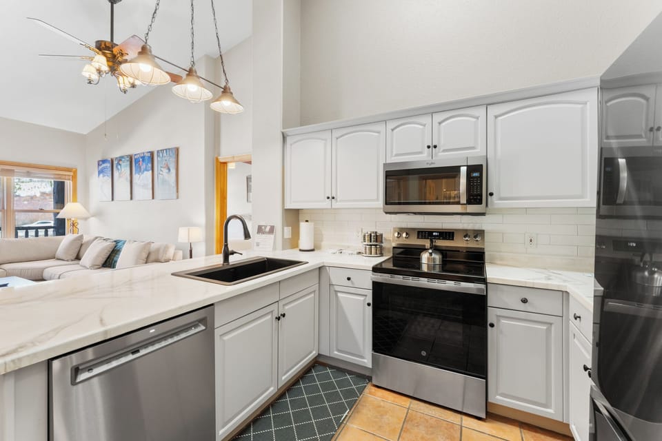 Your fully equipped kitchen awaits with modern appliances and everything needed to create memorable meals during your stay.