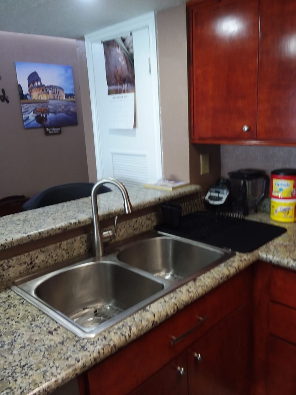 Kitchen with stainless sink and faucet sprayer View 2