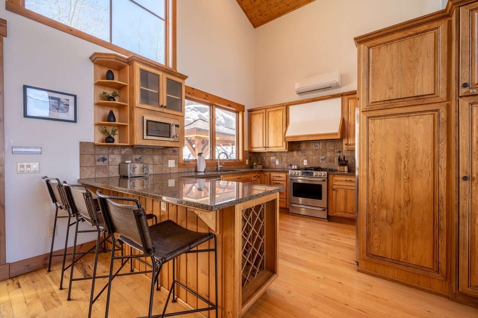 Seating for three at the breakfast bar
