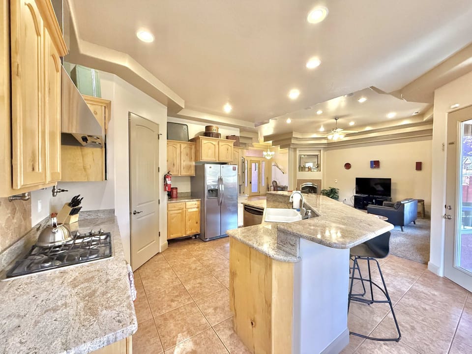 The fully appointed kitchen, with high-end appliances, provides everything you need to cook up your favorite meals