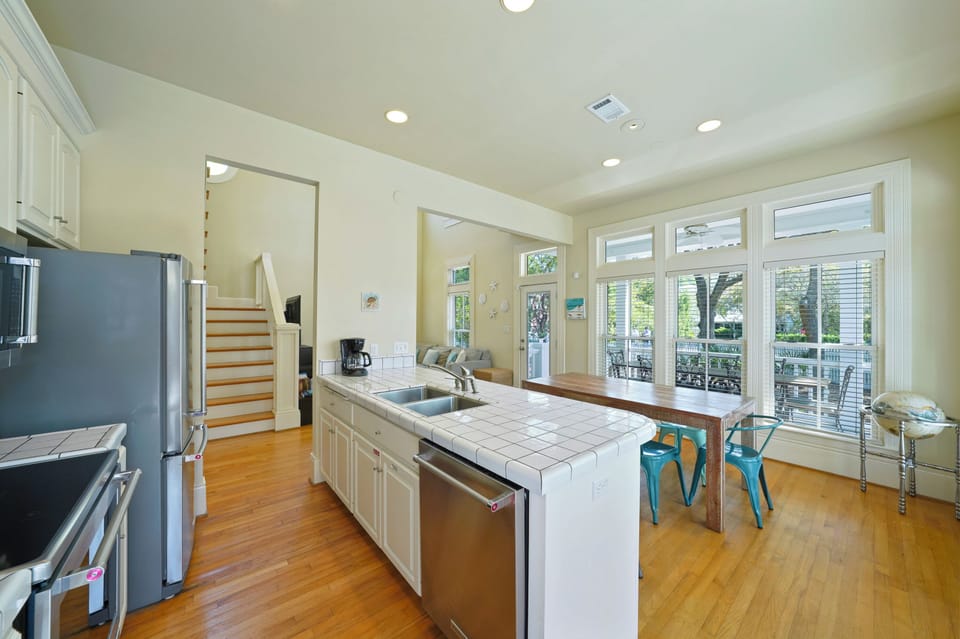 FIRST FLOOR COMBINED DINING, KITCHEN, & LIVING