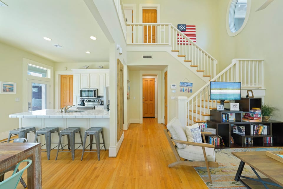 LIVING AREAS ARE DOWNSTAIRS AND BEDROOM IS UPSTAIRS