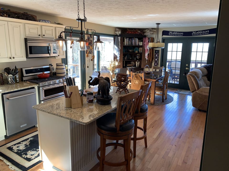 Kitchen and dining area toward valley view