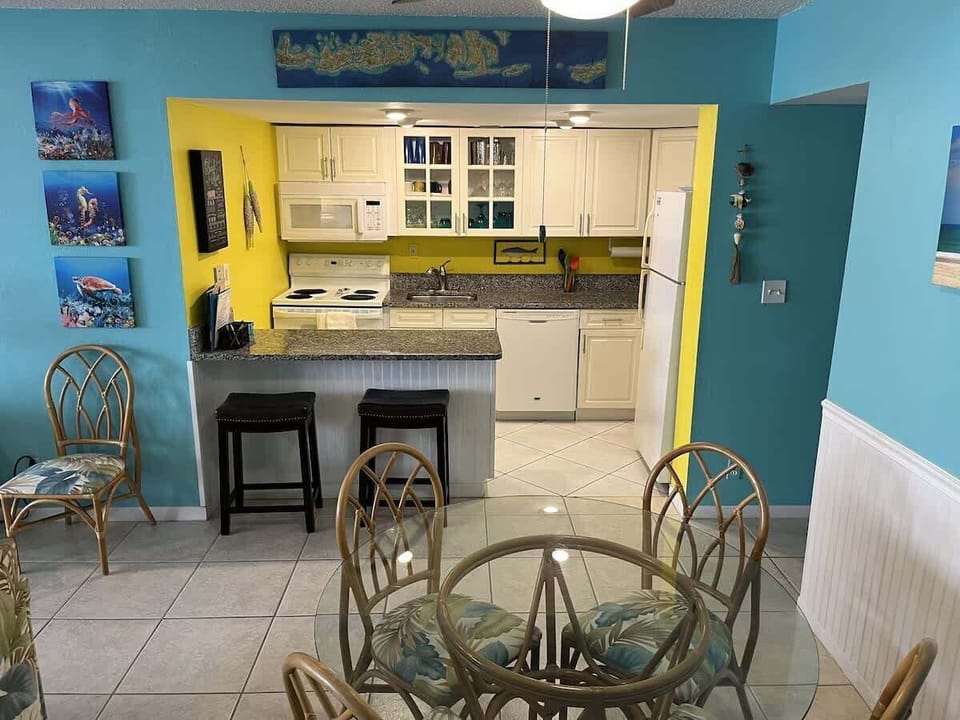 Dine and cook in a space that is open and connected.