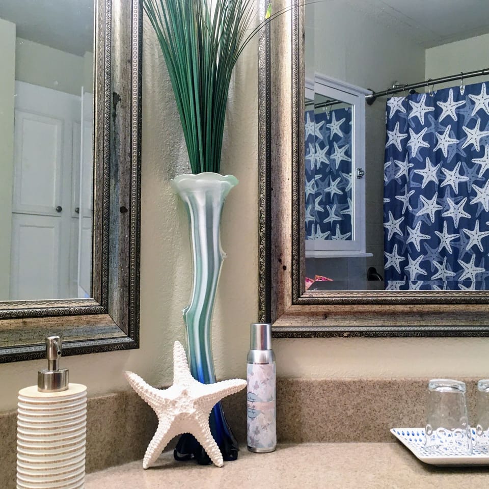 Sparkling clean en-suite bathroom with a touch of the beaconing beach