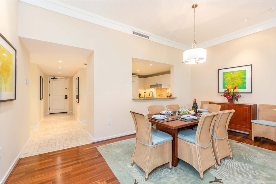 Share meals with family or friends in this inviting dining space, perfectly placed between the kitchen and living area.