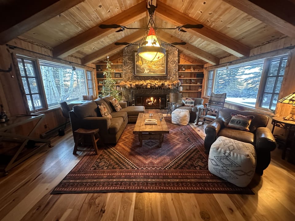 Living room sitting area and fireplace, facing opposite TV