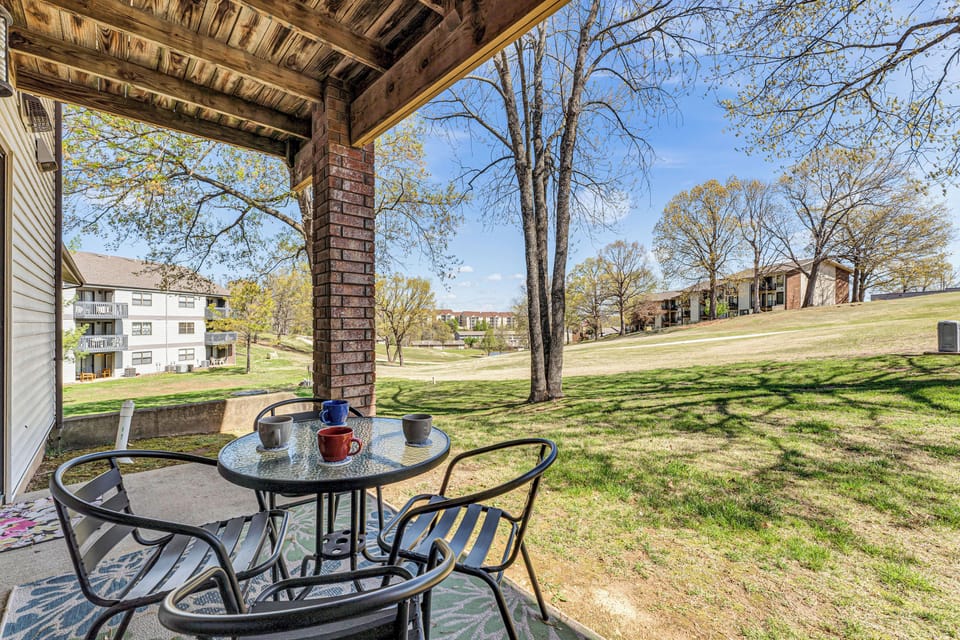 Golf front patio with yard games and view of golf course