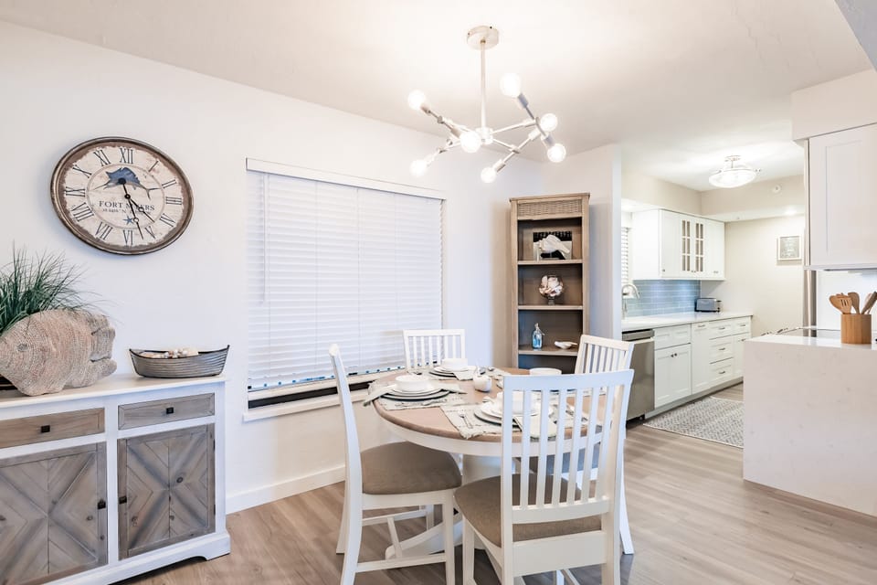 Dining room table can be expanded to accommodate 6.