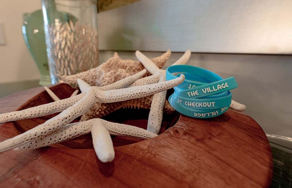 Beach-themed decor, grab a wristband and enjoy the coastal vibes
