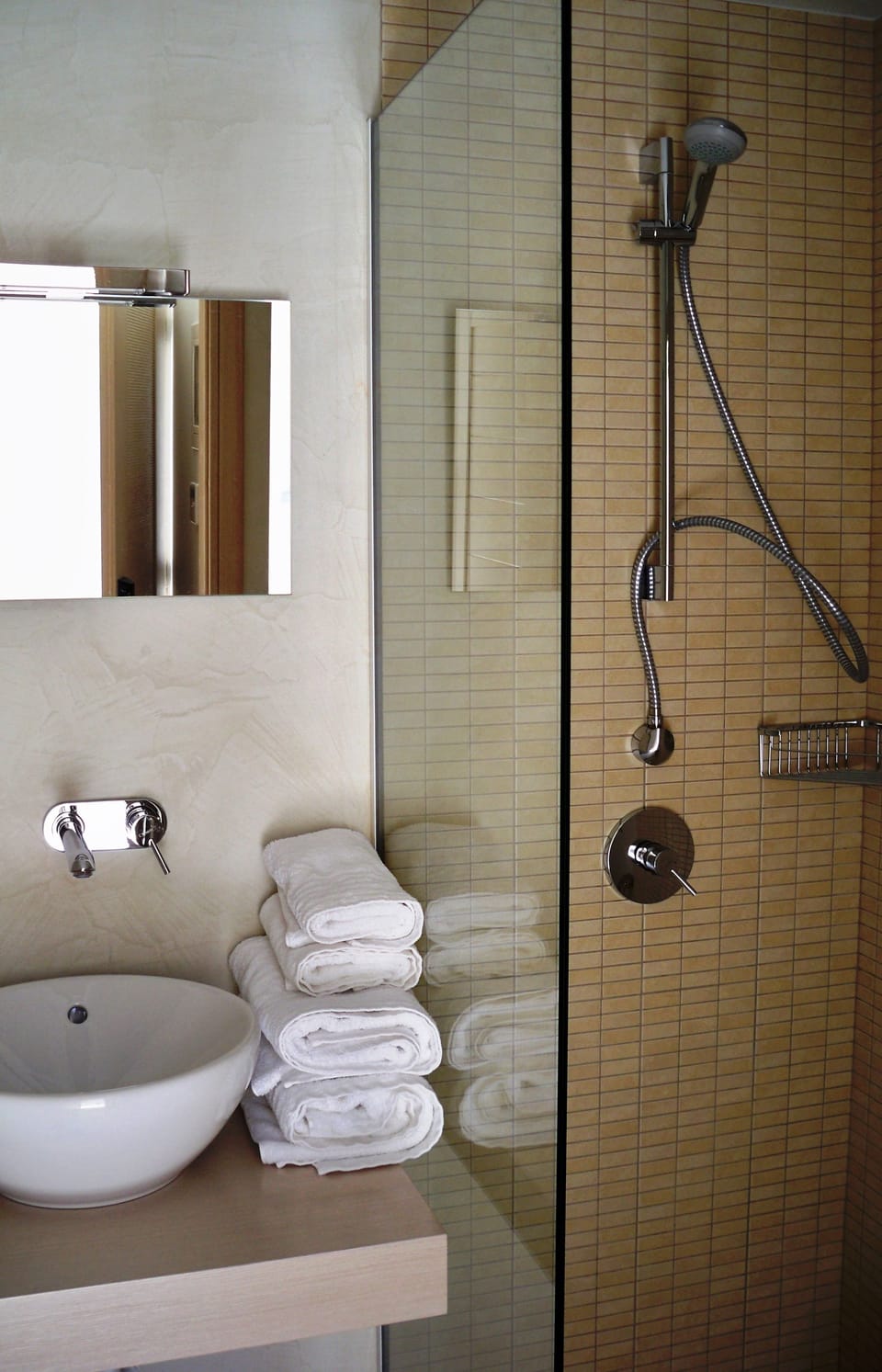 Shower, rainfall showerhead, hair dryer, towels