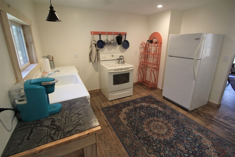 The kitchen triangle! Sink, stove, refrigerator.  
