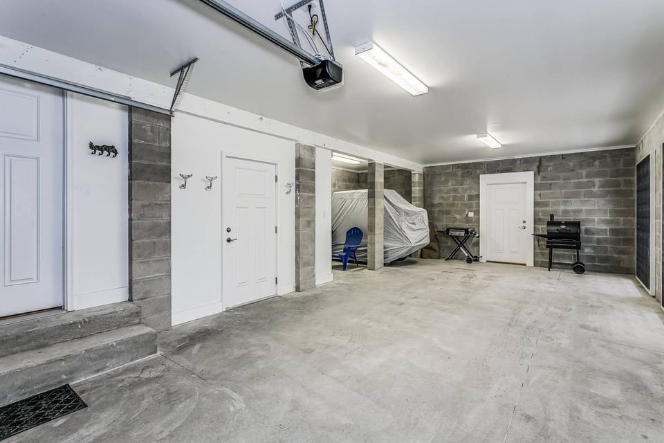 Garage has room for your car and access to the back patio