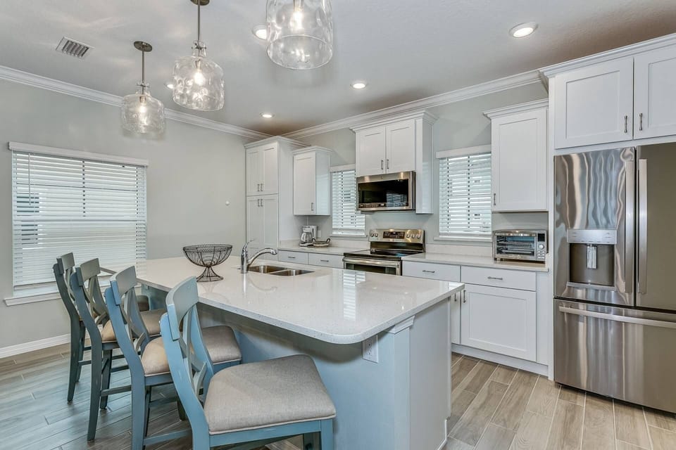 This modern kitchen has everything you need to cook a delicious dinner for the whole family