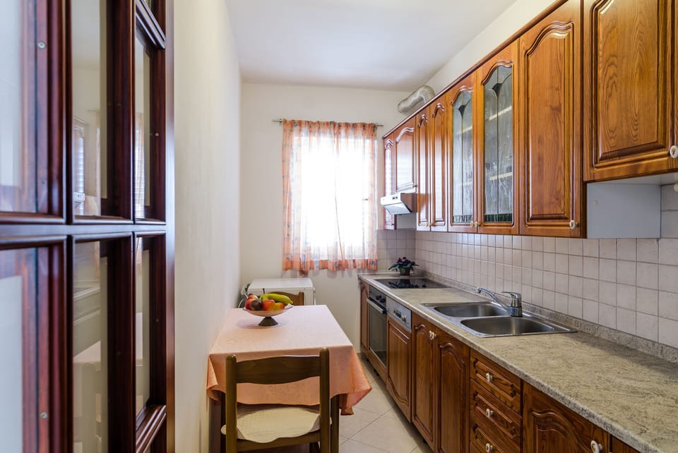 Apartment (Three-Bedroom Apartment) | Private kitchen | Fridge, microwave, oven, dishwasher