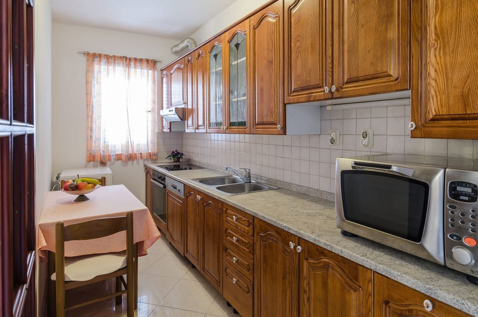 Apartment (Three-Bedroom Apartment) | Private kitchen | Fridge, microwave, oven, dishwasher