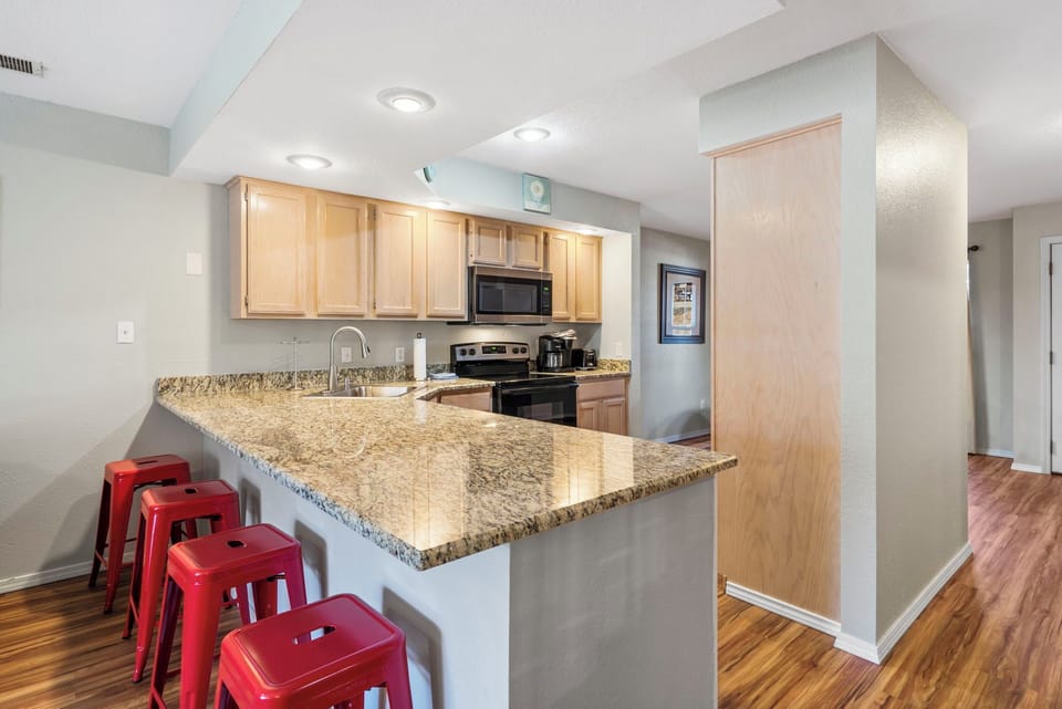 Full Kitchen with Additional Bar Seating