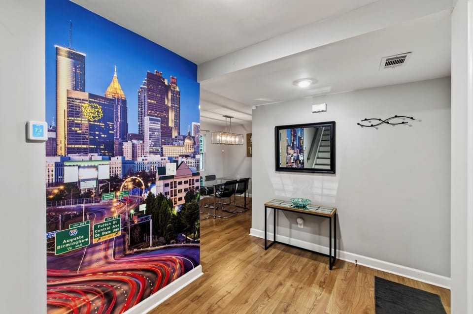 A full -wall mural of Atlanta greets you as you step inside. Welcome to the city and your "home away from home"!