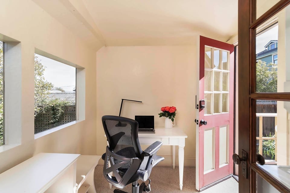 Office area with door to the back yard