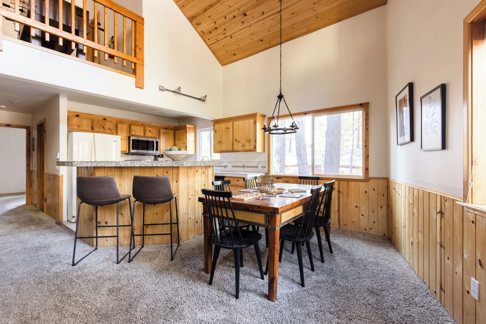 Dining area and kitchen in Cabin 1.