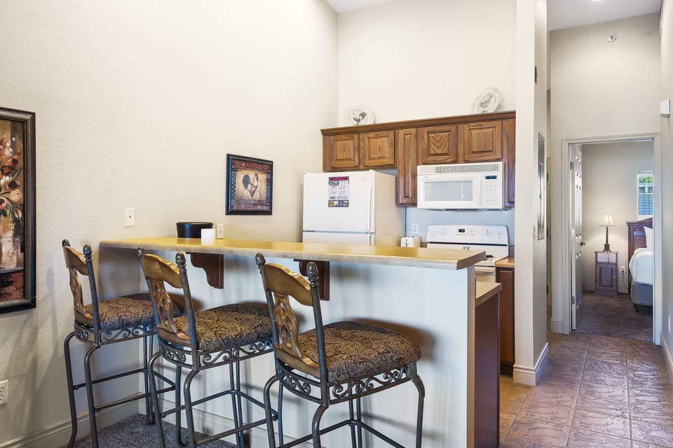 Full Kitchen with Modern Appliances and Extra Bar Seating