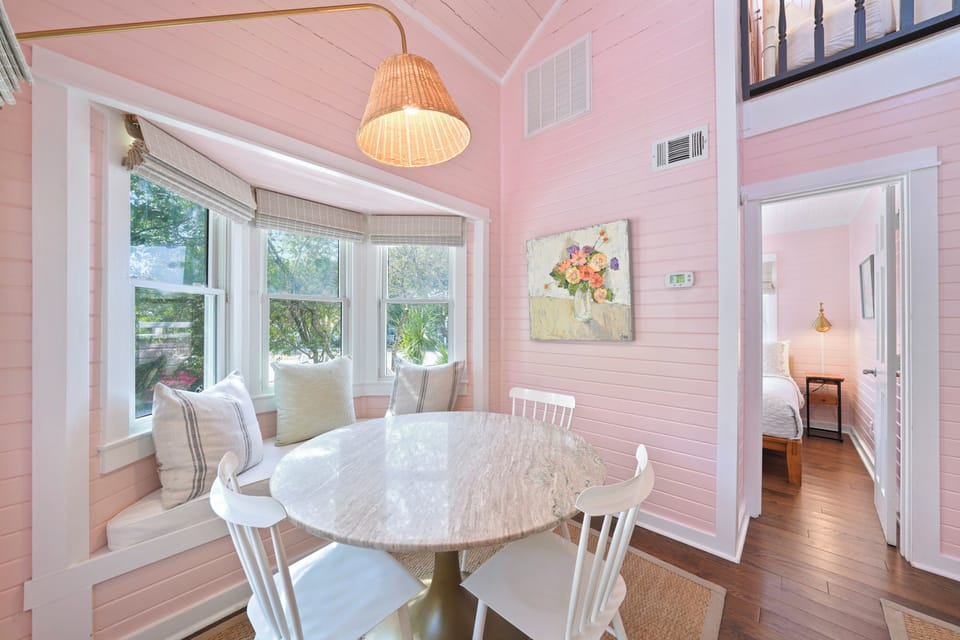 ADJACENT DINING AREA OPEN TO LIVING SPACE