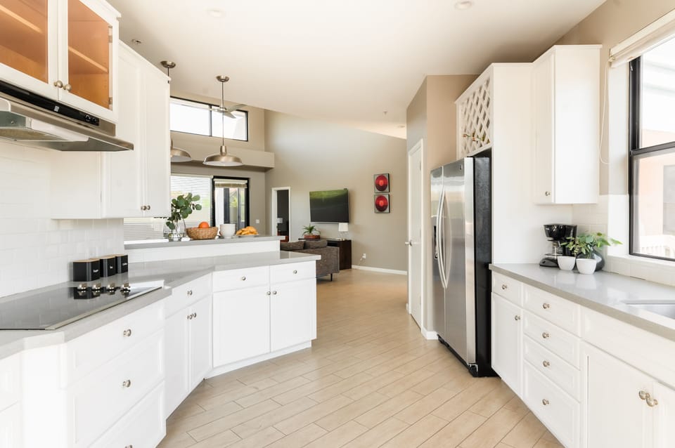Too many restaurants in Downtown to decide? Make a home-cooked meal in the kitchen (Ivory I)