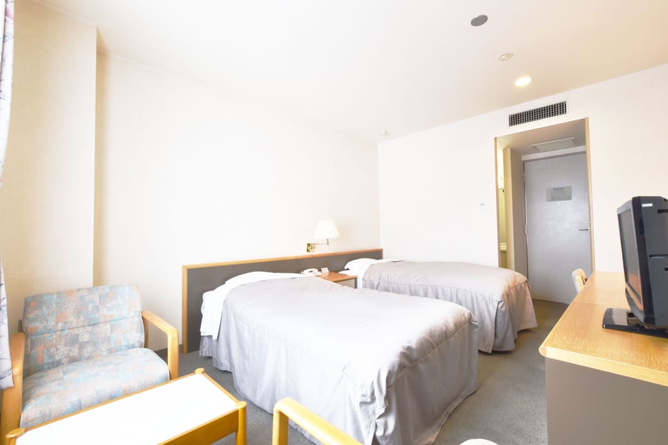 Twin Room, Non Smoking | In-room safe, desk, free WiFi