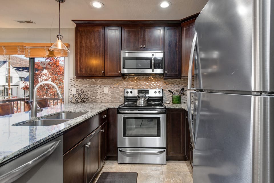Fully Equipped Kitchen and Offers Stainless Steel Appliances