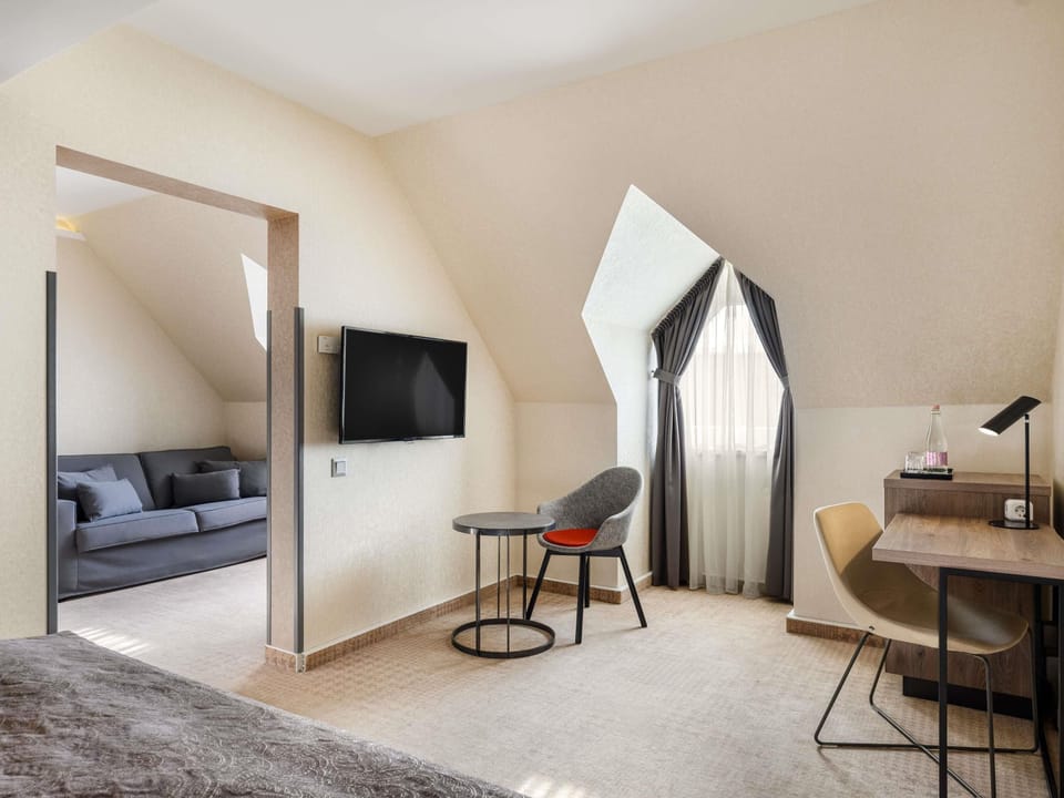 Junior Suite, 1 Double Bed | Premium bedding, minibar, in-room safe, desk