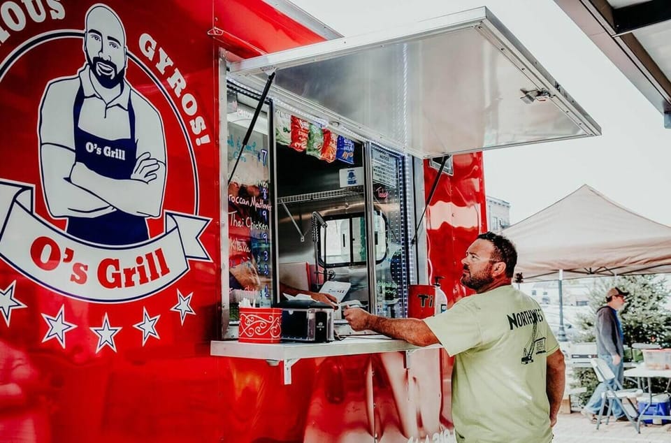 Savor delicious gyros and more at O's Grill, a local favorite for authentic flavors and vibrant vibes.