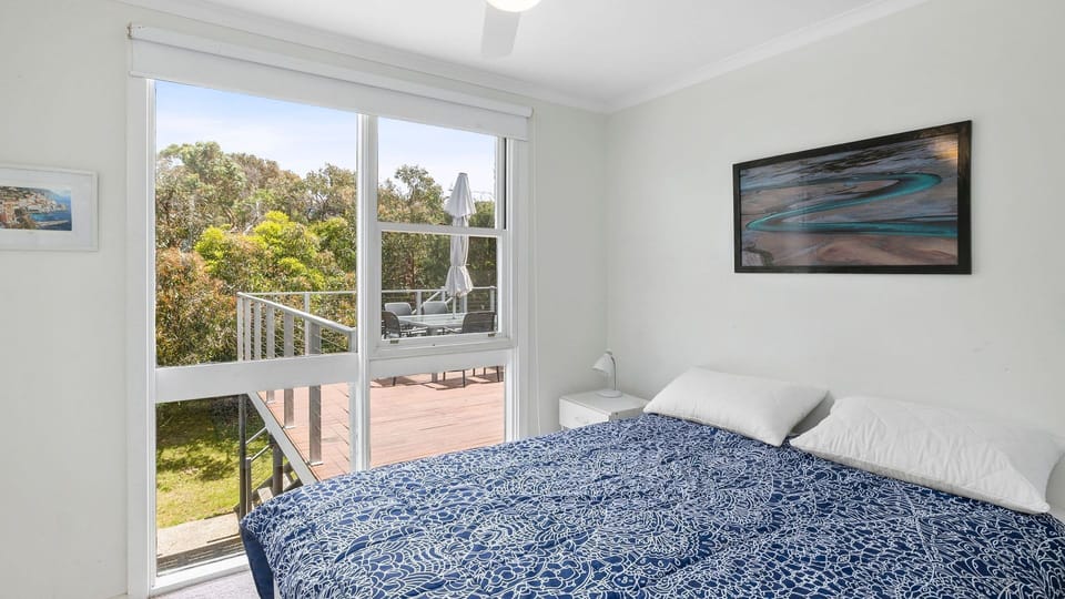 Bedroom 2: Queen bed and a built-in robe