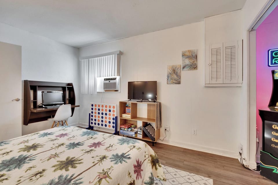 Office desk and computer with smart TV in 4th bedroom/game room/ office.