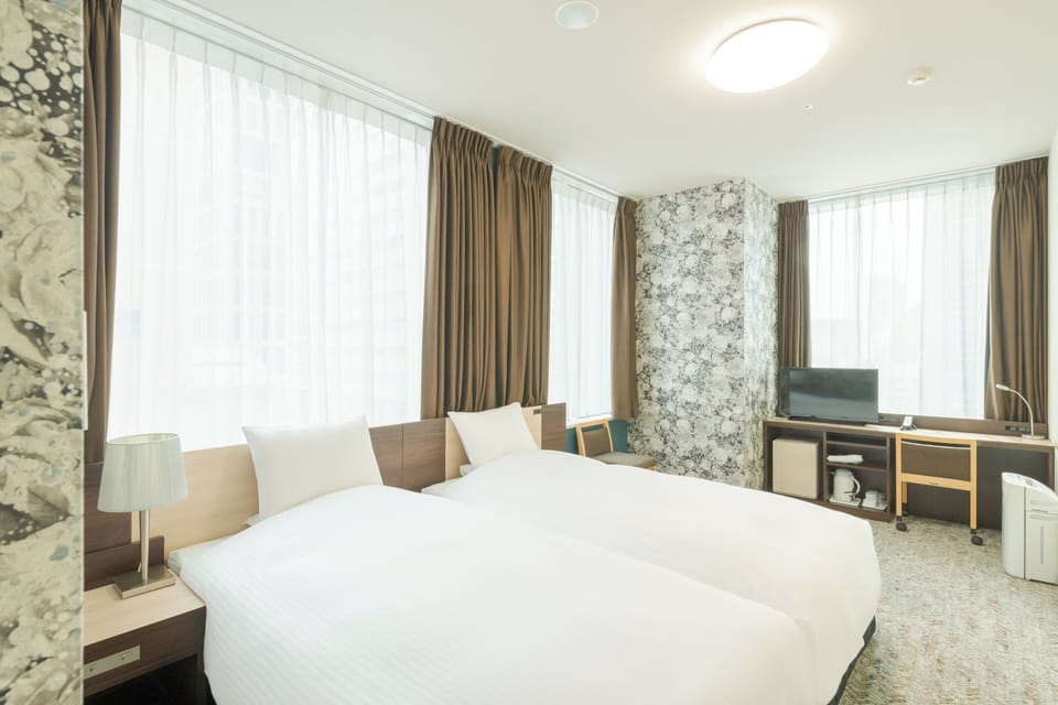 Twin Room, Non Smoking (Rose Floor) | Down comforters, in-room safe, desk, laptop workspace